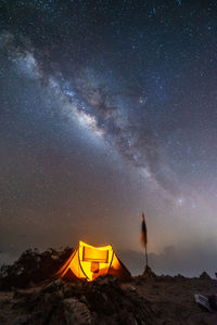 The milky way with camping on the hill at thailand