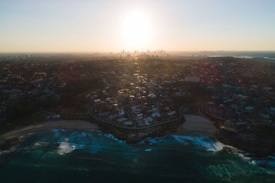 High angle view of cityscape against sky during sunset