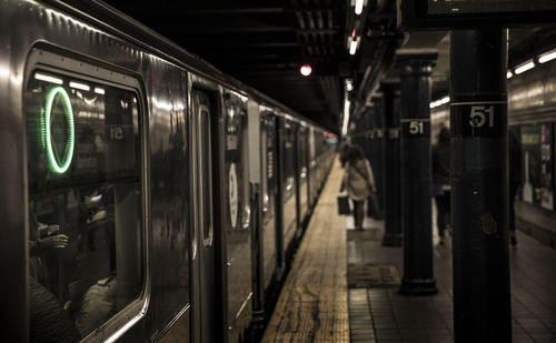 Train at railroad station during night