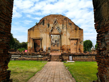 View of temple against cloudy sky