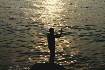 Reflection of people in water
