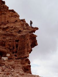 Low angle view of rock formation on cliff