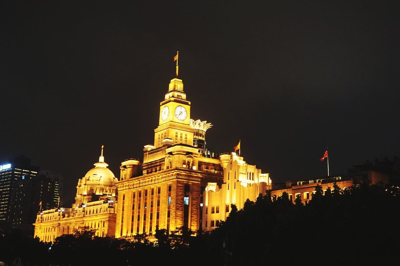 ILLUMINATED BUILDINGS AT NIGHT