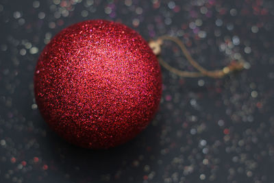 High angle view of red berries on table