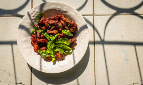 High angle view of salad in plate on table