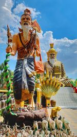 Statue of temple against sky