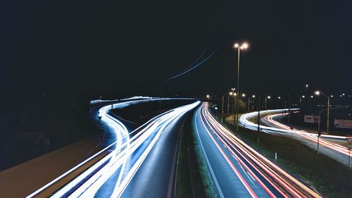 Light trails on road at night