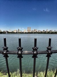 View of cityscape against blue sky