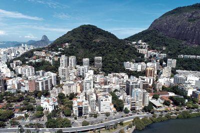 High angle view of illuminated buildings in city against sky