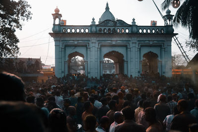 Group of people in front of historical building