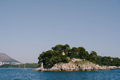 Scenic view of sea against clear sky