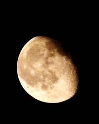 Moon over black background