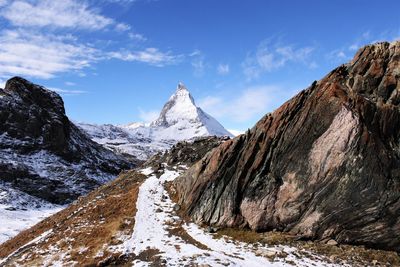 Scenic view of matterhorn mountain with sunny day clear blue sky.  stock photo copy space 