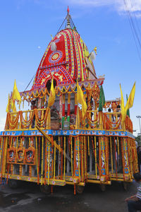 Low angle view of temple against sky at night