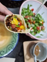 Close-up of hand holding food