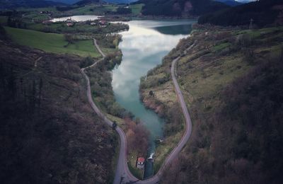 High angle view of road amidst mountains