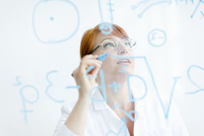 Female scientist working in laboratory