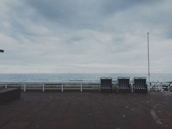 Scenic view of sea against cloudy sky