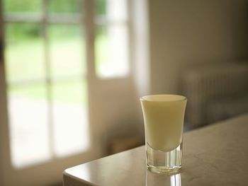 Close-up of glass on table