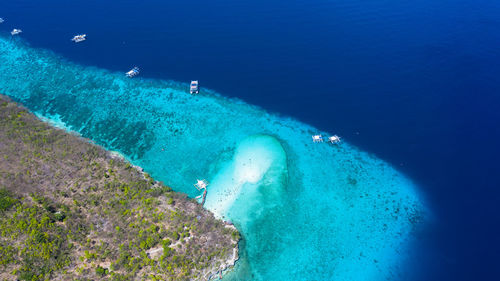 High angle view of people on sea shore