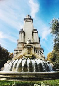 Low angle view of fountain against sky