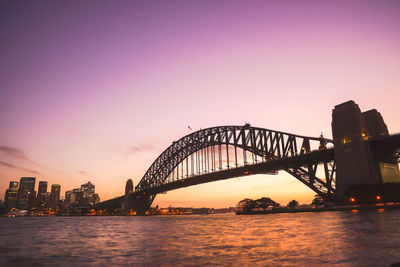 View of bridge over river in city