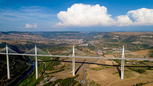 High angle view of bridge in city against sky