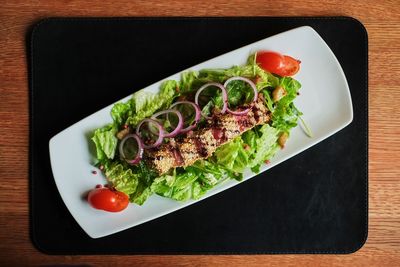 High angle view of salad served in plate on table