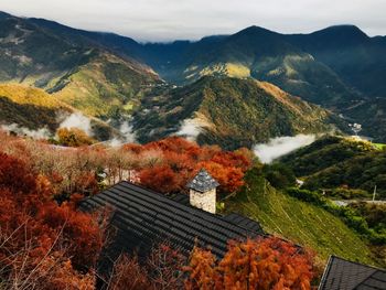 Scenic view of mountains against sky during autumn