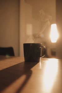 Close-up of coffee cup on table