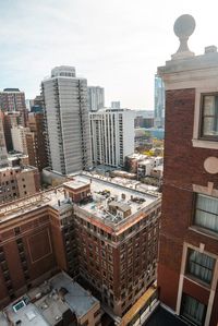 Aerial view of cityscape against sky