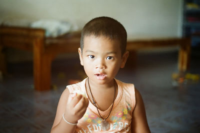 Portrait of cute boy at home