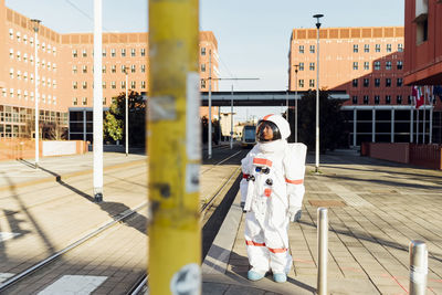 Full length of man in city against building