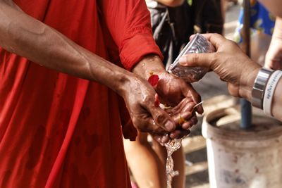 Midsection of person washing hands