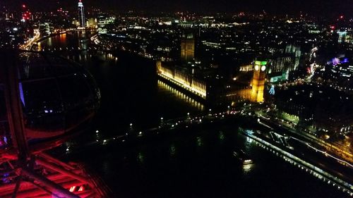 Aerial view of illuminated city at night