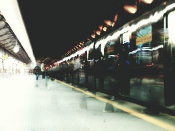 Illuminated railroad station at night