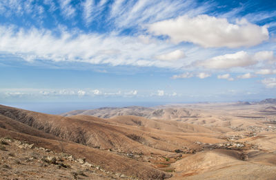 Scenic view of desert against sky