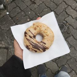 High angle view of person holding bread