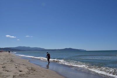 Scenic view of calm sea against sky