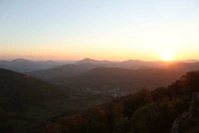 Scenic view of mountains against sky during sunset