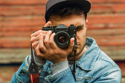 Portrait of man photographing