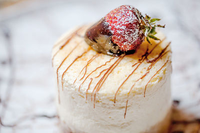 Close-up of strawberry on ice cream