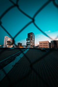 City buildings against blue sky