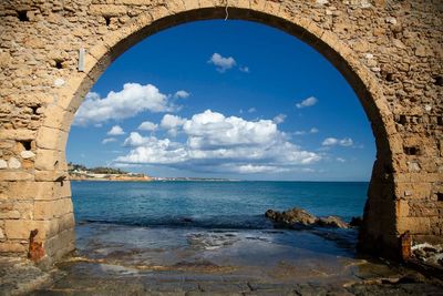 Scenic view of sea against blue sky