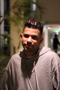 Portrait of young man standing outdoors