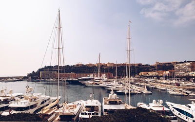 Boats moored at harbor