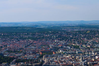 Aerial view of cityscape against sky