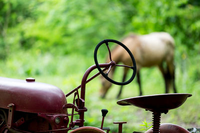 Close-up of tractor on field