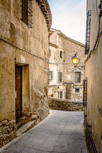 Narrow alley amidst buildings