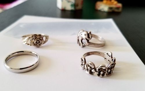 High angle view of wedding rings on table